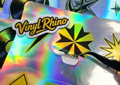 Durable, waterproof, and UV-resistant holographic vinyl stickers for personalizing laptops and water bottles, featuring a long-lasting oil-slick shimmering finish.