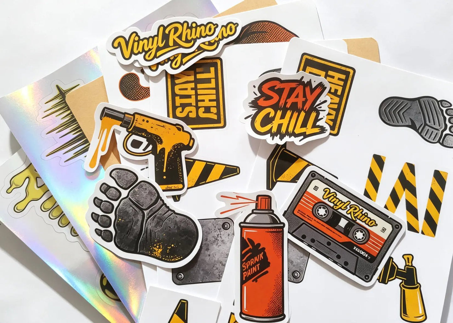 Custom kiss-cut sticker sheets containing multiple unique retro and industrial designs on a single page, easy to peel and share.
