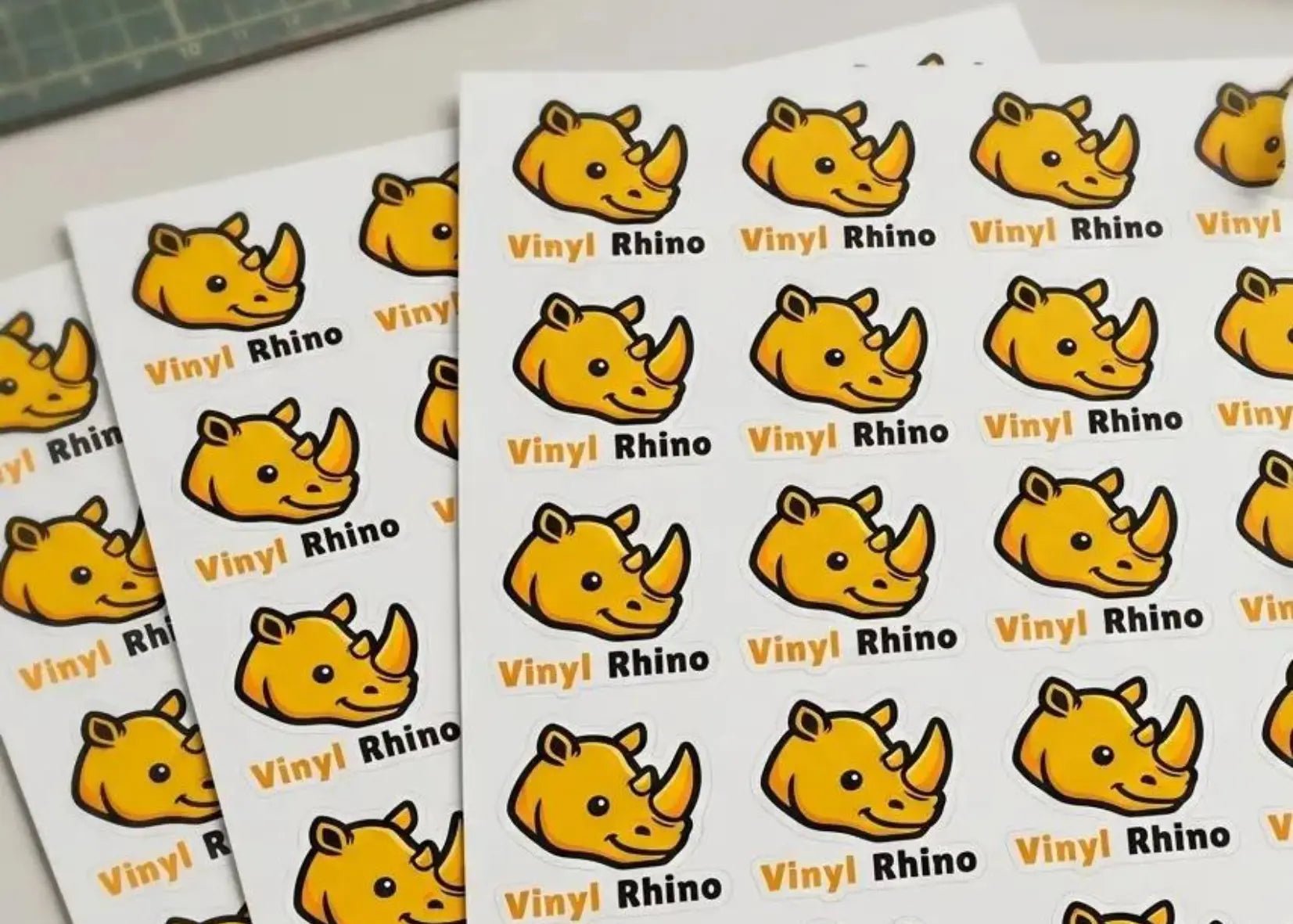 Custom sheet labels displaying multiple brand logos printed on a single, easy-to-peel sheet. Ideal for small business product packaging.
