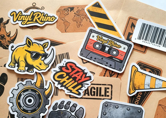 Our comprehensive sticker material sample pack, including holographic, kraft paper, clear, and standard vinyl finishes to help you choose the perfect match.