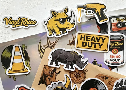Assorted premium custom vinyl stickers featuring retro industrial designs and durable waterproof die-cut shapes for brand marketing.